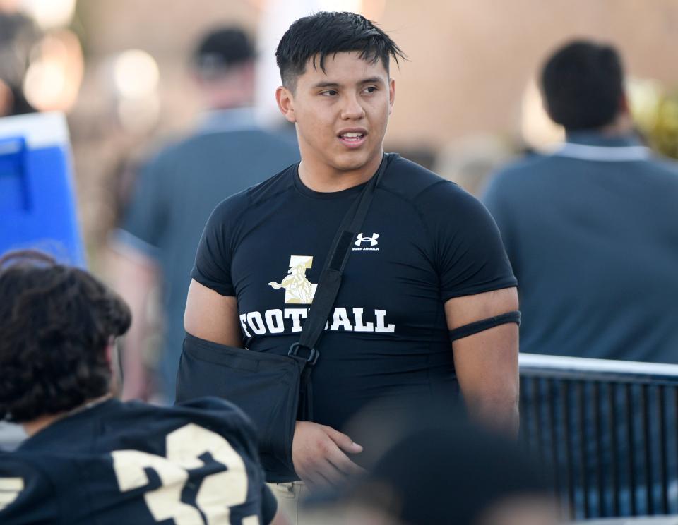 Lubbock High's Zeke Rodriguez wears an arm sling during the non-district football game against Andrews, Friday, Sept. 22, 2023, at Lowrey Field in PlainsCapital Park.