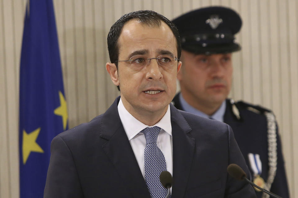 FILE - In this Thursday, March 1, 2018 file photo, Nikos Christodoulides speaks after taking the oath of office as Cyprus' new foreign minister during a ceremony at the Presidential Palace in Nicosia, Cyprus. Cyprus' foreign minister says on Friday, Jan. 18, 2019, he's optimistic that the US will soon start lifting a decades-old arms embargo because Washington acknowledges the island nation's contribution to bolstering stability and security in the east Mediterranean. (AP Photo/Petros Karadjias, File)