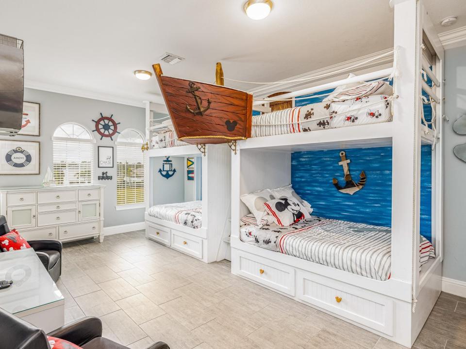 A Mickey Mouse Steamboat Willie-themed bedroom.