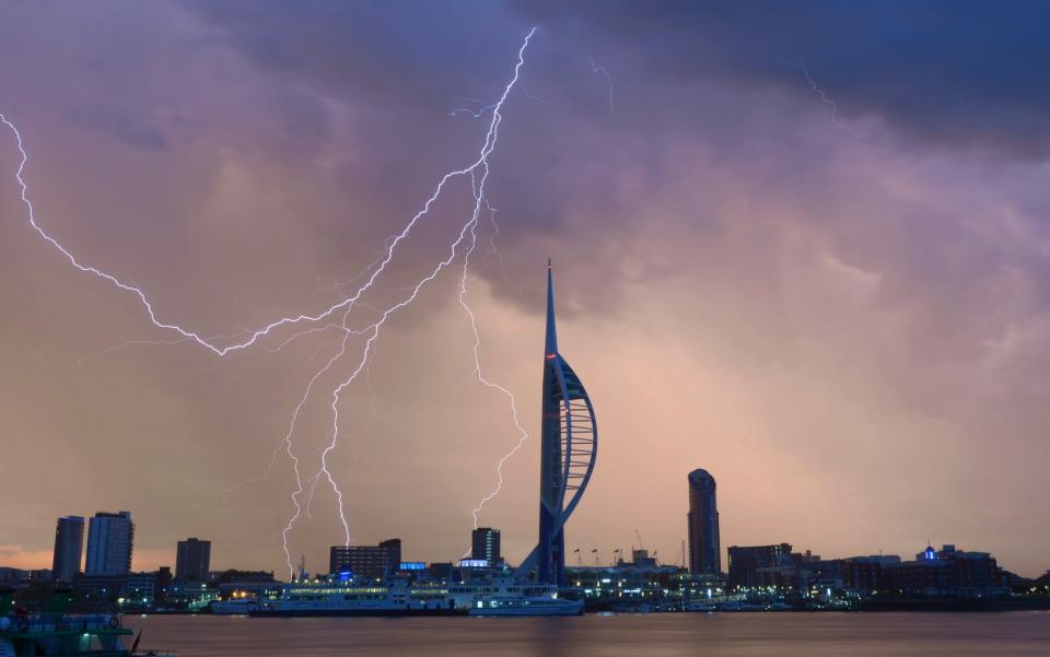 27/5/17 between 4.30am and 5am is a dramatic lightning storm over Portsmouth and the Spinnaker Tower as the sun rises - Credit: Paul Jacobs/pictureexclusive.com