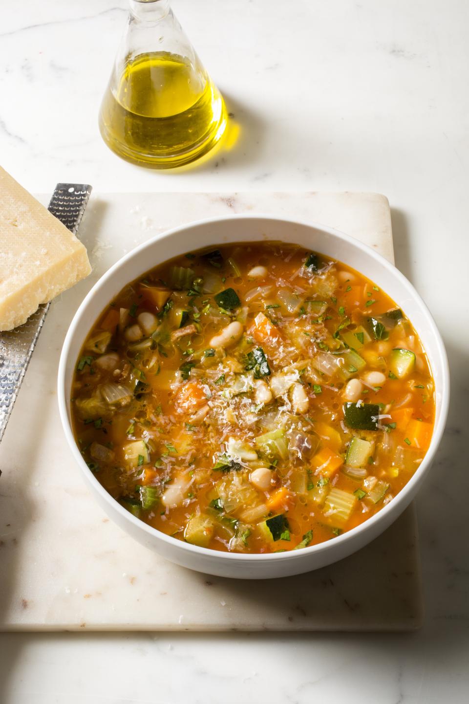 This undated photo provided by America's Test Kitchen in September 2018 shows a garden minestrone in Brookline, Mass. This recipe appears in the cookbook “Complete Slow Cooker.” (Carl Tremblay/America's Test Kitchen via AP)