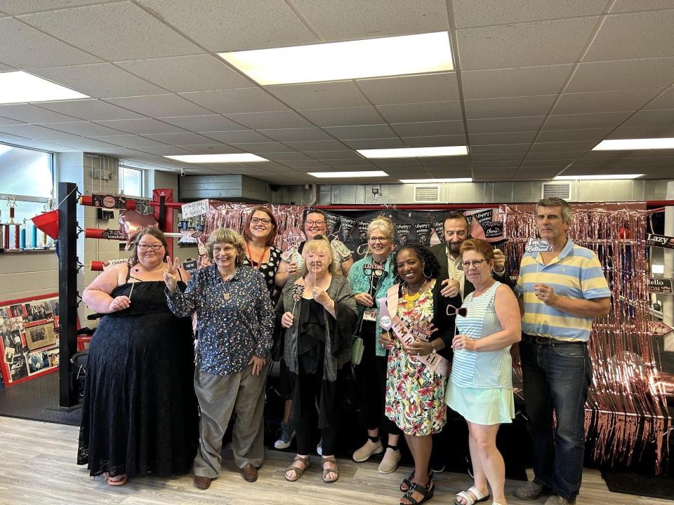 Vuncia Council (front row, second from right) is shown with guests at Tuesday's retirement party.