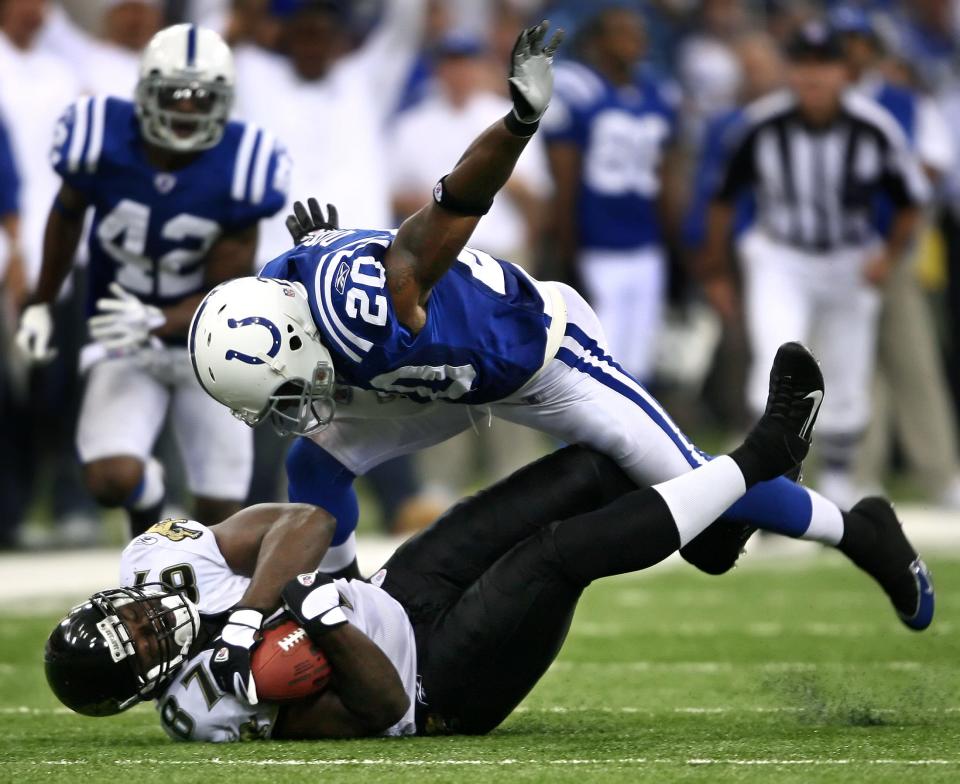Colts defensive back Mike Doss puts a jarring stop to Jacksonville tight end George Wrightster leaving him short of a first down in the third quarter of Sunday's game against the Jacksonville Jaguars on Sunday, September24, 2006. (Matt Detrich / The Indianapolis Star) 