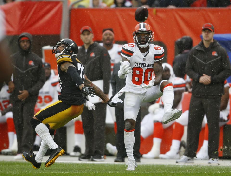 <p>Cleveland Browns wide receiver Jarvis Landry (80) catches a pass against Pittsburgh Steelers defensive back Joe Haden (23) during the first half of an NFL football game, Sunday, Sept. 9, 2018, in Cleveland. (AP Photo/Ron Schwane) </p>