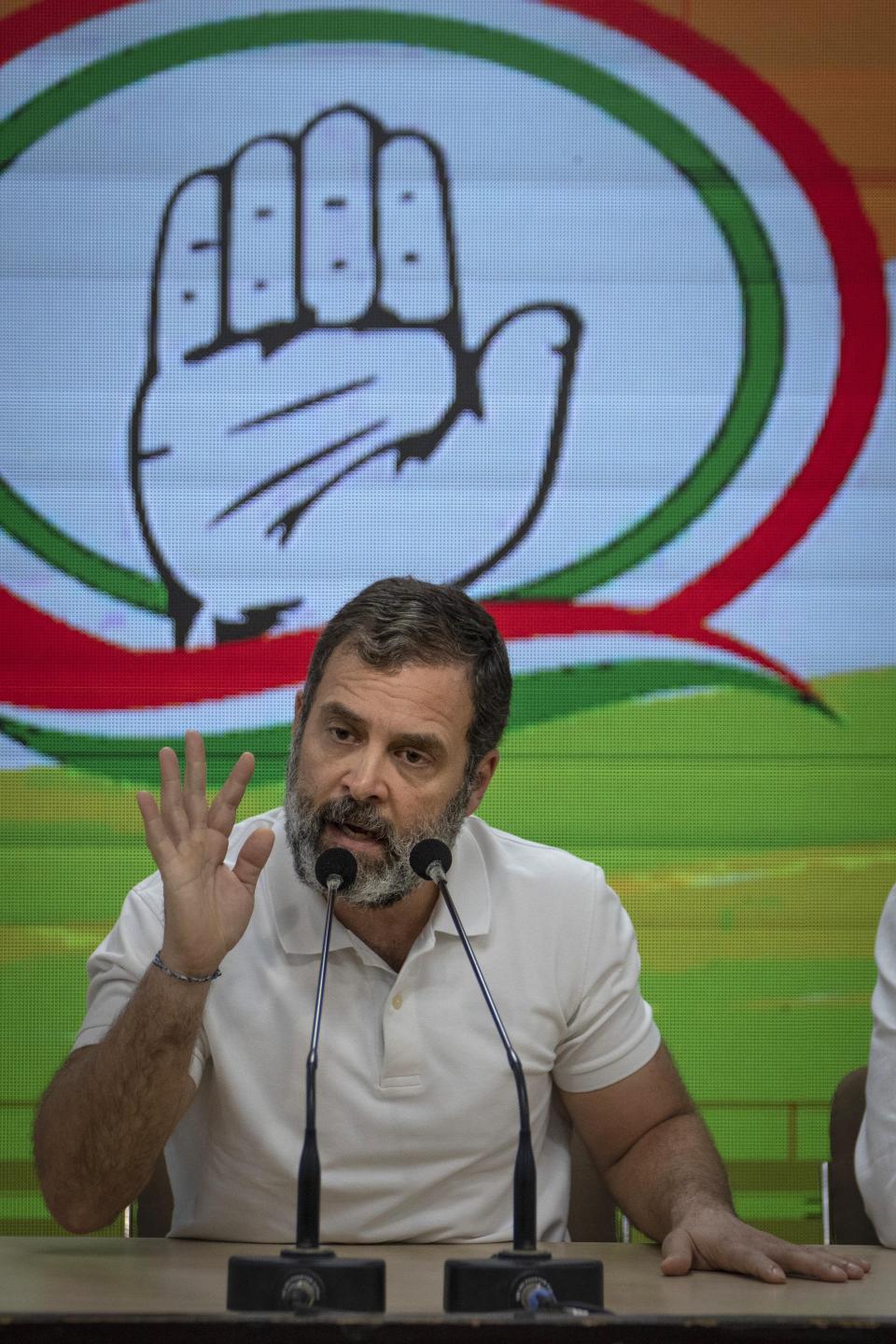 Indian opposition leader Rahul Gandhi addresses a press conference after he was expelled from parliament Friday, a day after a court convicted him of defamation and sentenced him to two years in prison for mocking the surname Modi in an election speech, in New Delhi, India, Saturday, March 25, 2023. The conviction and expulsion were widely condemned by opponents of Modi, who say democracy and free speech are under assault by a ruling government seeking to crush any dissent. (AP Photo/Altaf Qadri)