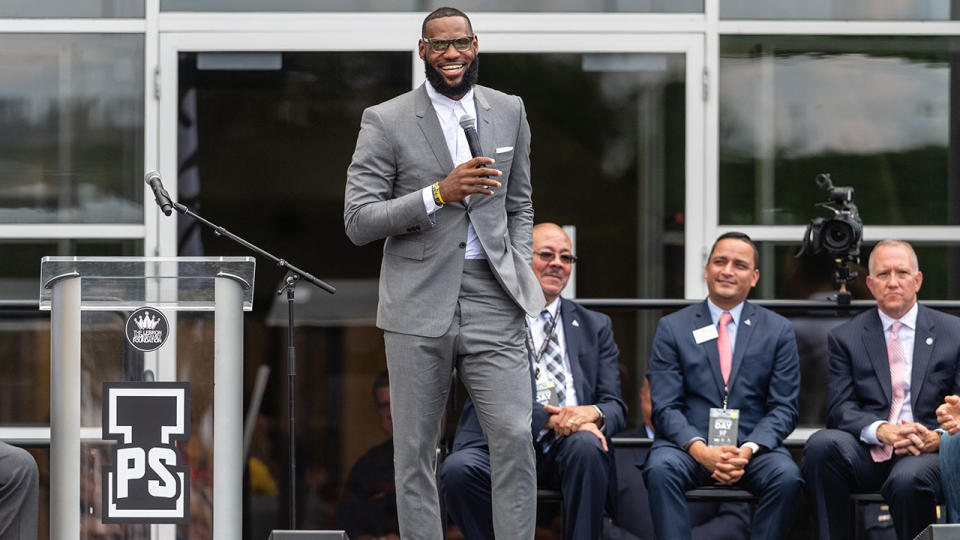 LeBron James speaks at the opening of his new school. Pic: Getty