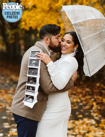 <p>Kelly Lemon Photography</p> Zack Goytowski and Bliss Poureetezadi Goytowski with the ultrasound of their first child, who is due in spring 2024