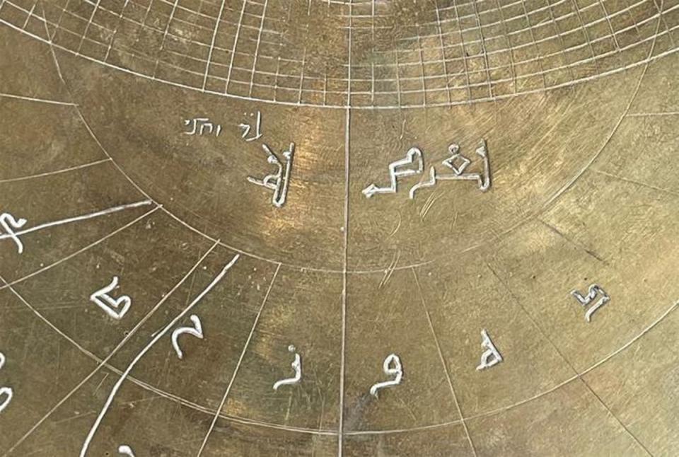 Close up of the Verona astrolabe showing Hebrew inscribed (top left) above Arabic inscriptions (Federica Gigante)