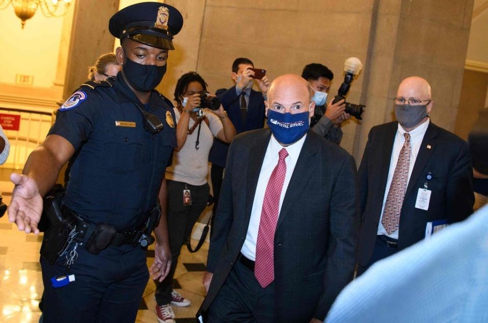 Postmaster General Louis DeJoy arrives for a meeting with House Speaker Nancy Pelosi, D-Calif., Senate Minority Leader Chuck Schumer, D-N.Y., Treasury Secretary Steven Mnuchin and White House chief of staff Mark Meadows at the  Capitol in Washington on Aug. 5.