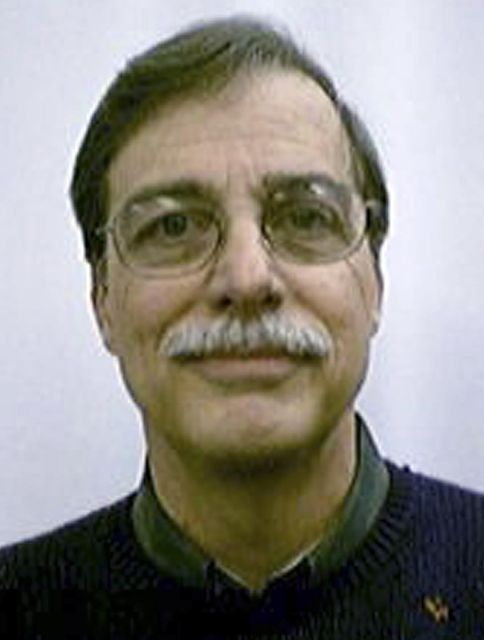This undated photo provided by the University of Connecticut shows music professor Robert Miller at the school in Storrs, Conn. University officials knew of sexual abuse allegations against Miller a decade before taking action, according to independent investigative report released Wednesday, Feb. 26, 2014. Officials were notified on several occasions of Miller's on-campus behavior, and reports that he had abused children. (AP Photo/University of Connecticut)