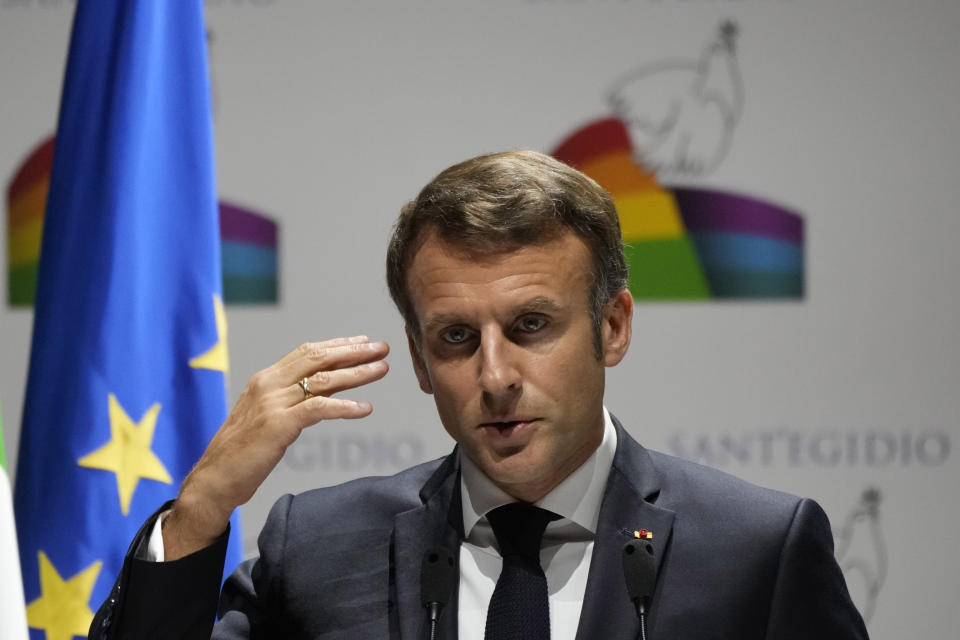 French President Emmanuel Macron delivers his speech at "Cry for peace" an international conference for peace organized by the Community of Sant'Egidio in Rome, Sunday, Oct. 23, 2022. (AP Photo/Alessandra Tarantino)