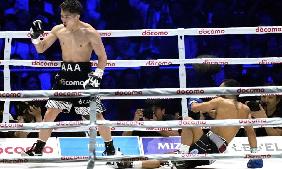 <span>Naoya Inoue celebrates a knockdown of Luis Nery in the second round of their title fight. </span><span>Photograph: Hiro Komae/AP</span>