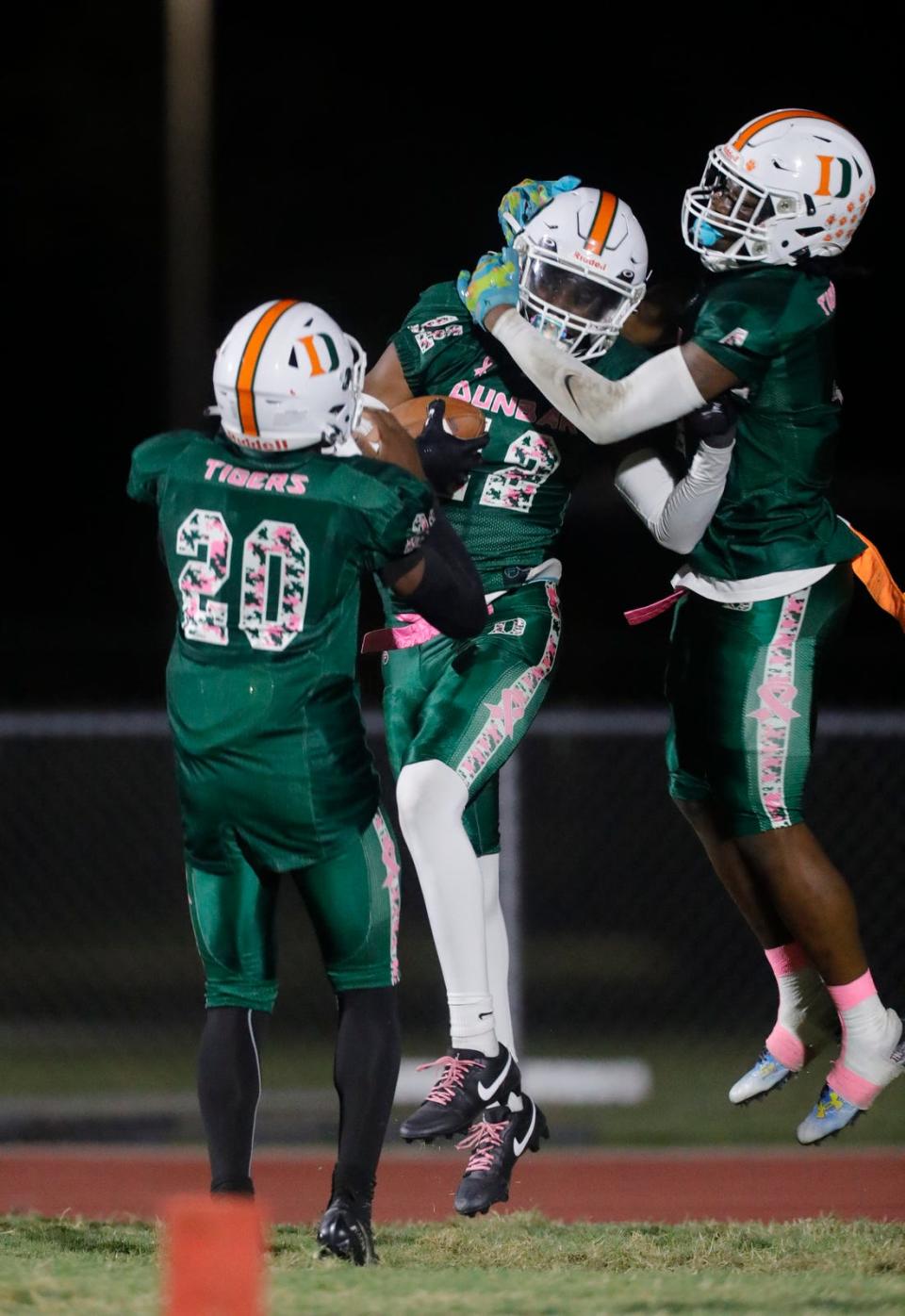 Dunbar player Chris Singleton evades a defender and runs in for a touchdown. The Dunbar High School Tigers defeated the visiting South Fort Myers Wolfpack Friday night, October 27, 2023. Dunbar clinched the district title with a final score of 41-17.