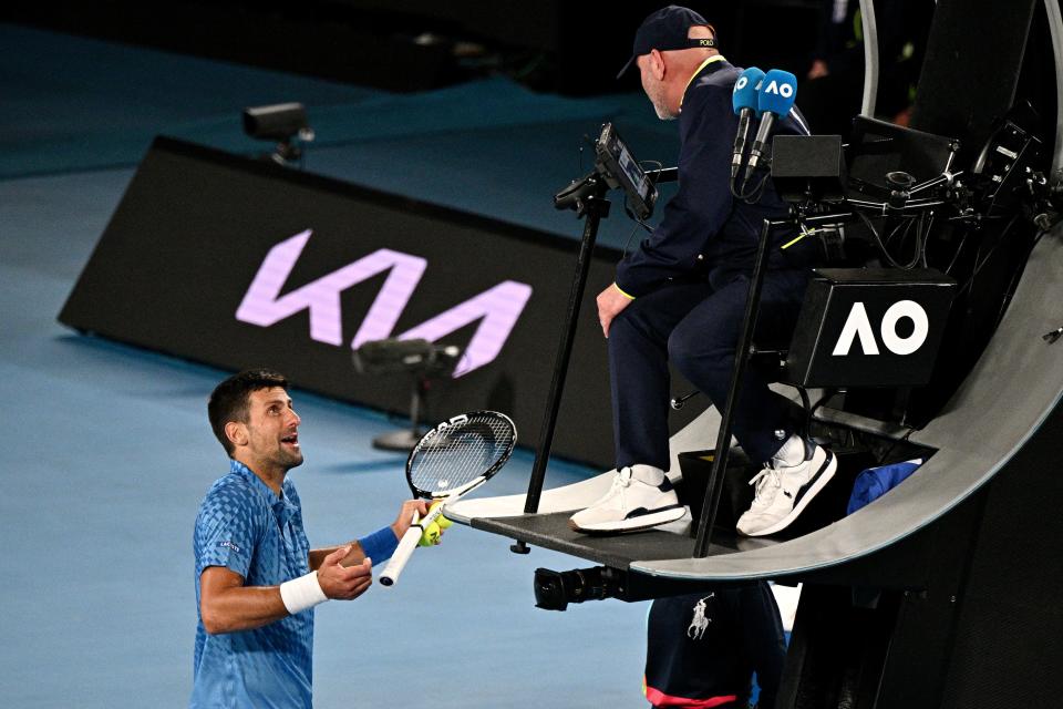 Novak Djokovic (pictured) speaking to the chair umpire.