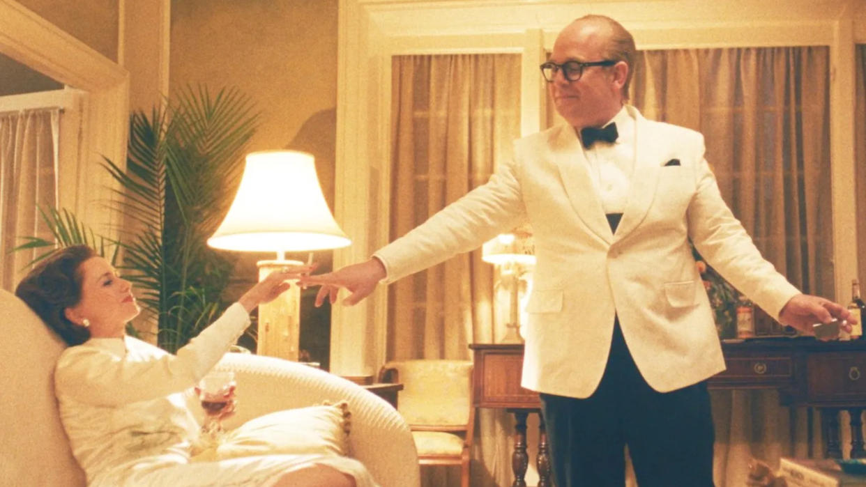  Naomi Watts as Babe Paley and Tom Hollander as Truman Capote in Disney+'s Feud: Capote vs the Swans. 