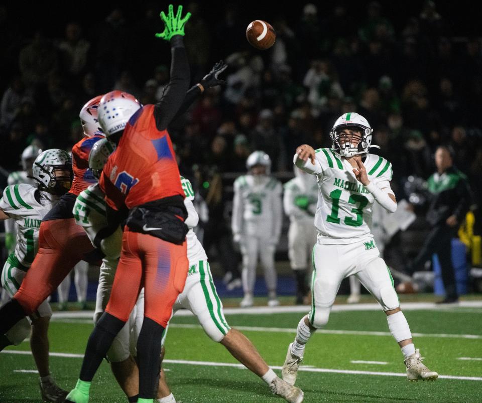 Mainland's John Franchini throws a pass during the South Jersey Group 4 championship football game between Mainland and Millville played in Millville on Friday, November 10, 2023.