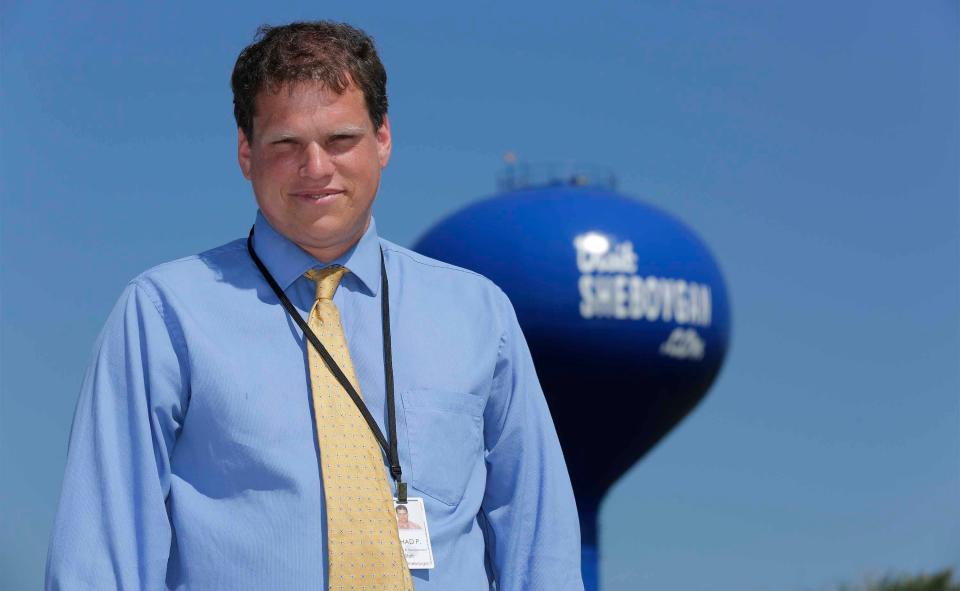 FILE - Chad Pelishek, then director of Planning & Development for the City of Sheboygan, poses near the water tower at SouthPointe Enterprise Campus June 9, 2021, in Sheboygan.