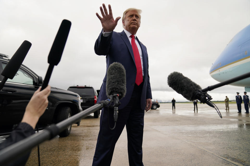 President Donald Trump walks away from the media to board Air Force One for a trip to a campaign rally in Freeland, Mich., Thursday, Sept. 10, 2020, in Andrews Air Force Base, Md. (AP Photo/Evan Vucci)