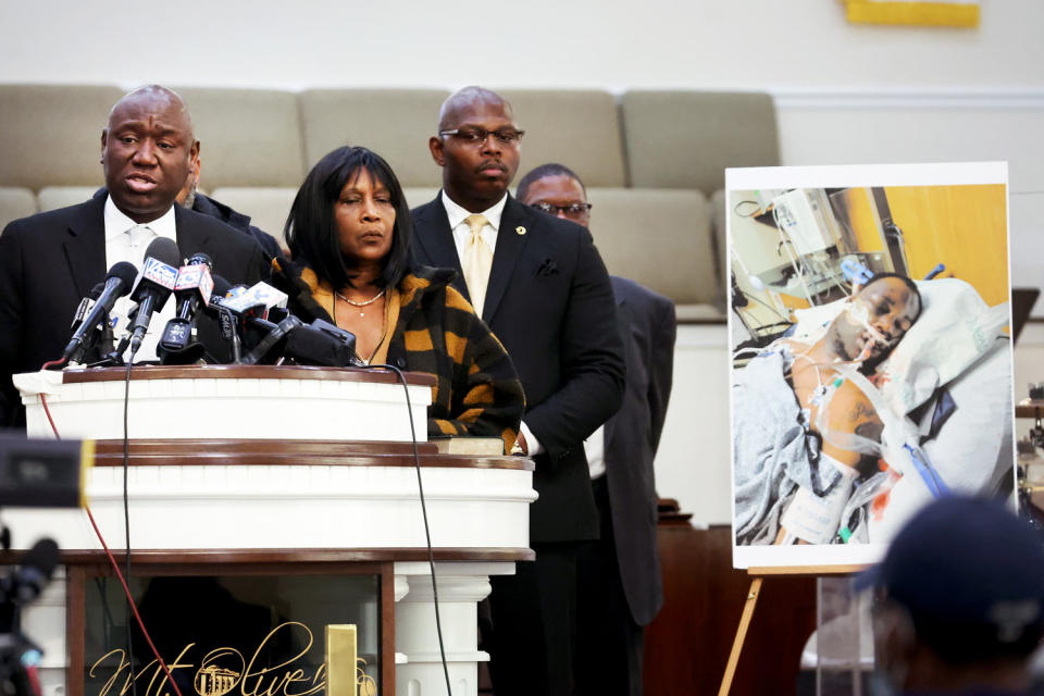 Attorney Ben Crump, RowVaughn Wells, and Rodney Wells speak during a press conference about Tyre Nichols (Scott Olson / Getty Images file)