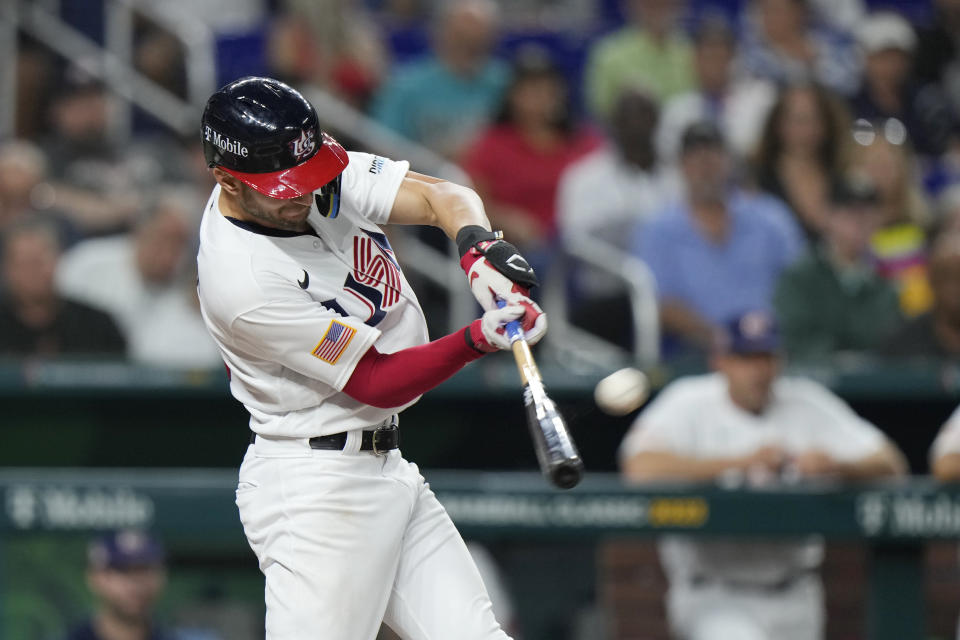 United States' Trea Turner hits a home run during the second inning of a World Baseball Classic game against Cuba, Sunday, March 19, 2023, in Miami. (AP Photo/Wilfredo Lee)