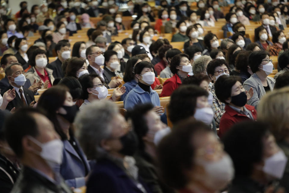 Christians wearing face masks attend a service at the Yoido Full Gospel Church in Seoul, South Korea, Sunday, May 10, 2020. South Korea's President Moon Jae-in urged citizens not to lower their guard down, but said there's no reason to be panicked amid worries about a new surge in the coronavirus outbreak in the country.(AP Photo/Ahn Young-joon)