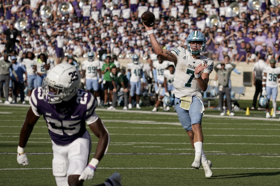 Tulane quarterback Michael Pratt throws for a touchdown during the second half of an NCAA college football game against Kansas State Saturday, Sept. 17, 2022, in Manhattan, Kan. Tulane won 17-10. (AP Photo/Charlie Riedel)