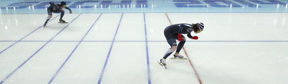 South Korean speedskaters Lee Kyou-hyuk, rear left, and Lee Sang-hwa practice their start during a training session at the Adler Arena Skating Center during the 2014 Winter Olympics in Sochi, Russia, Friday, Feb. 7, 2014. (AP Photo/Pavel Golovkin)