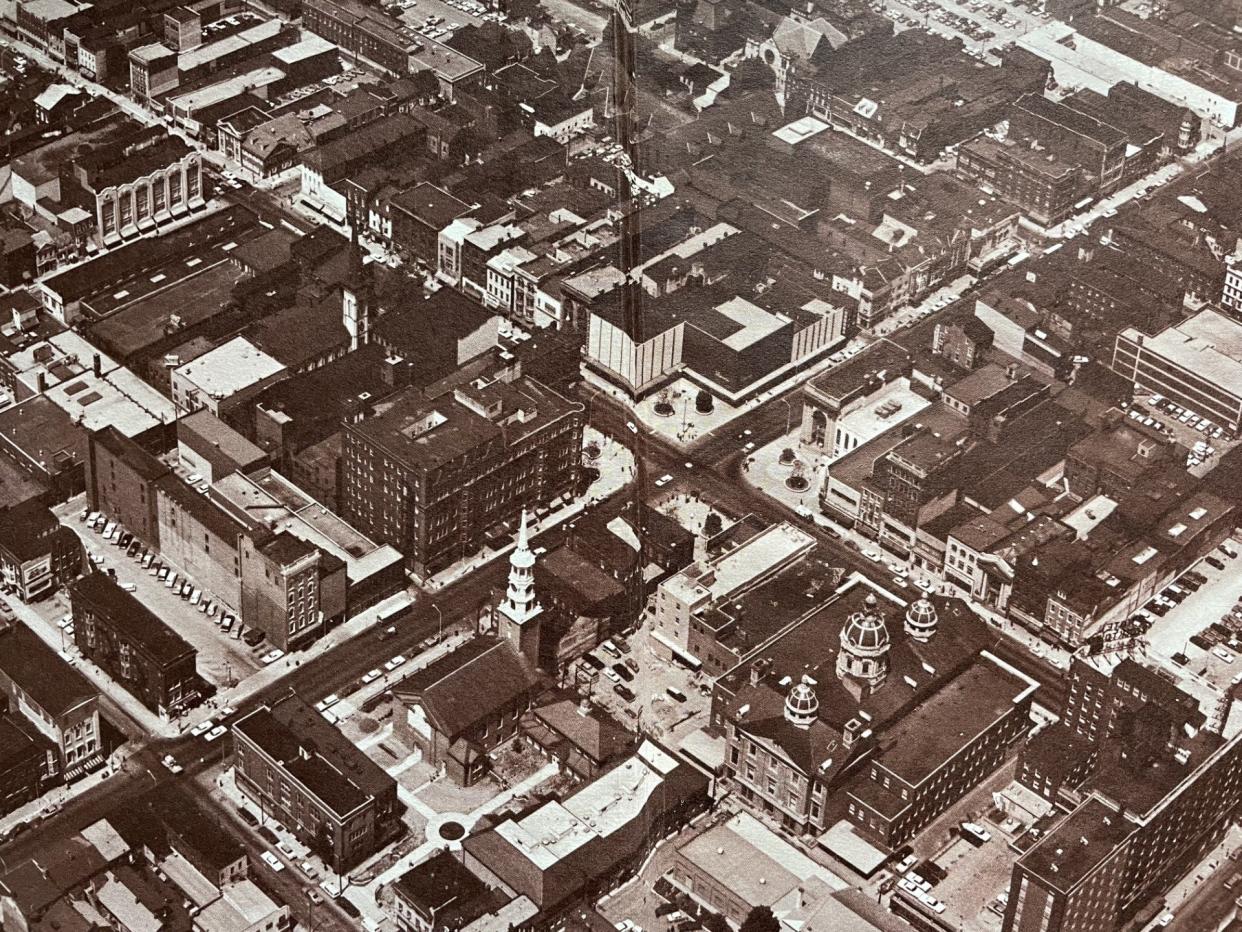 This view of Continental Square, center, circa 1967 shows the four built-out quadrants familiar today. Work on these plazas, as they’re called today, is underway to re-landscape the planters, improve lighting, replace the planter in the southeast plaza to create more event space and other improvements. The serpentine construction of West Market Street to slow truck and other traffic and to provide wider sidewalks for pedestrians came in the 1970s.