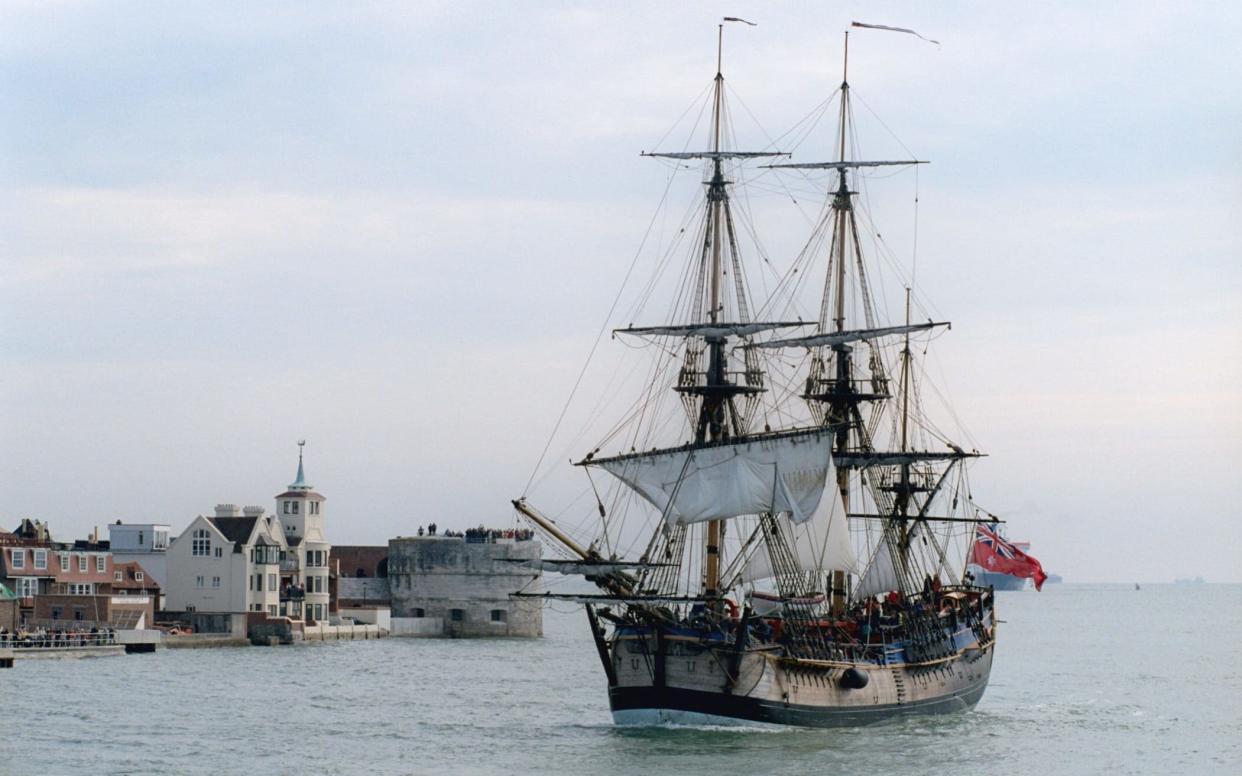 Replica of Captain Cook's 'Endeavour' receives a ceremonial escort as it sails into Portsmouth harbour,