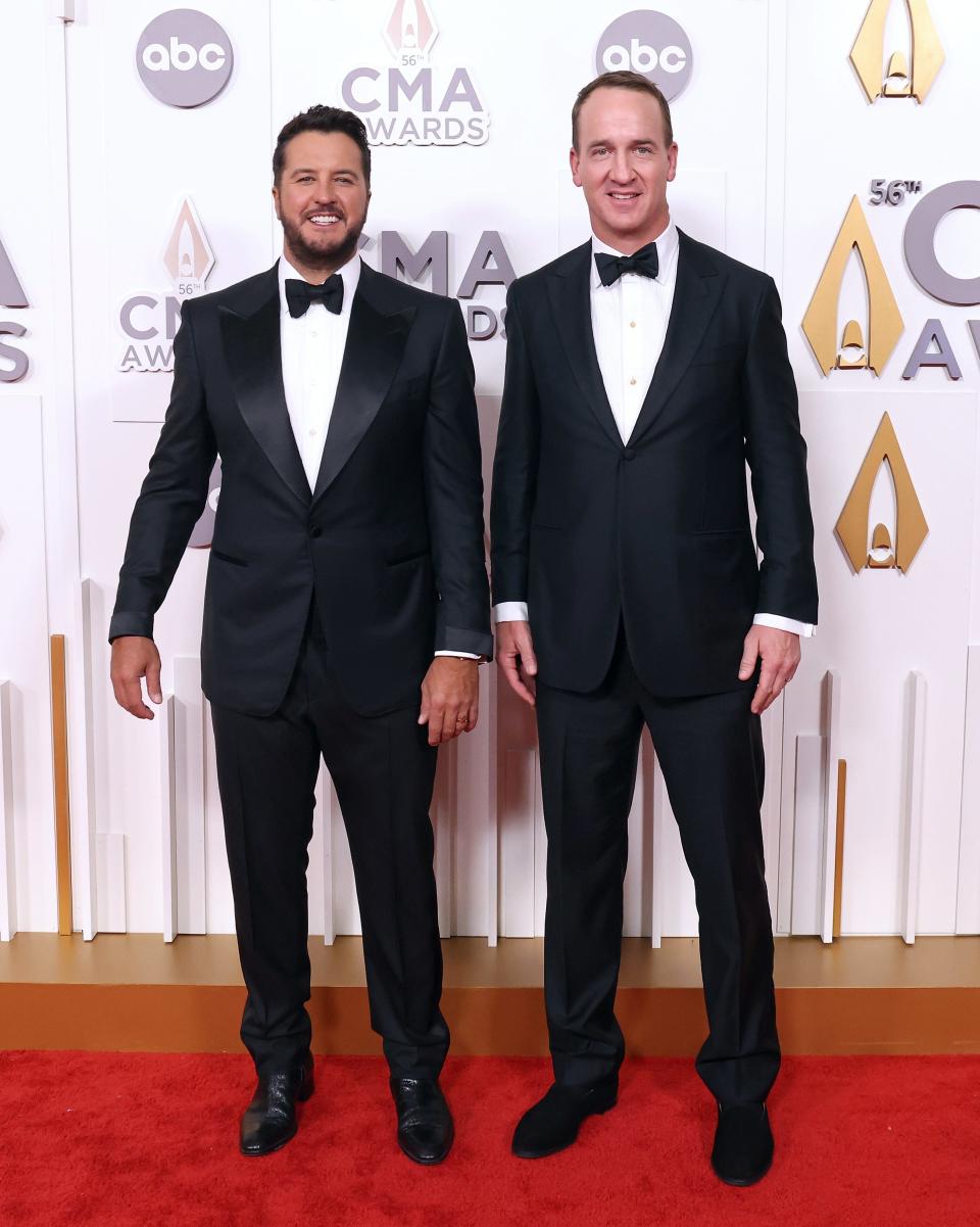 Luke Bryan and Peyton Manning attend the 56th Annual CMA Awards at Bridgestone Arena on November 09, 2022 in Nashville, Tennessee.