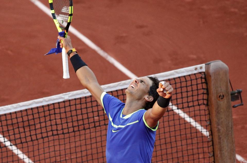 Spain's Rafael Nadal celebrates winning against Austria's Dominic Thiem during their semifinal match of the French Open