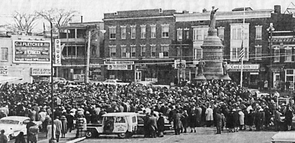 At noon March 14, 1965, more than 4,000 people gathered on Oneida Square in Utica in response to an appeal by the Rev. Dr. Martin Luther King Jr. for "sympathy meetings" throughout the nation to support a civil rights march in Alabama from Selma to Montgomery. During that march—part of a campaign to guarantee voting rights for blacks—about 600 demonstrators were clubbed and routed by state police. The rally in Utica was organized by the Inter-Religious Commission on Religion and Race of Greater Utica. The Rev. H. Robert Gemmer, speaking for the commission, said the rally had been endorsed unanimously by area clergy of all faiths and had expected to attract about 1,500 instead of the 4,000 from Utica and neighboring communities who converged at the Civil War monument on the square. The Rev. John J. Stack, Catholic chaplain of Utica State Hospital, told the crowd: "Selma's marchers cannot stand alone. Freedom under law must return to Selma now." Gemmer added: "In Selma, many Americans have become involved. In Utica today, we are standing up to be counted and demonstrating that we, too, want to become involved in the battle for civil rights." At the end of the rally, several church choirs led the crowd in singing "America the Beautiful" and "We Shall Overcome."
