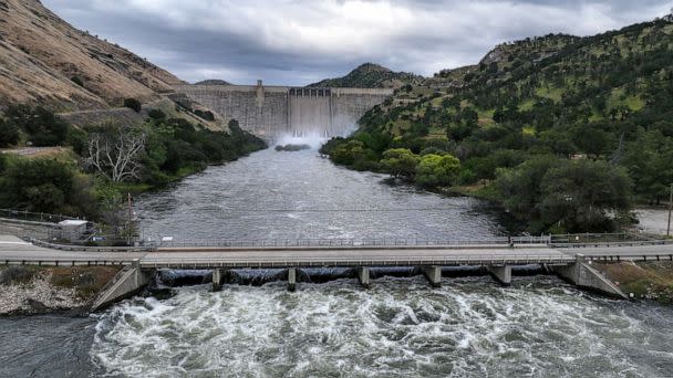 PHOTO: Water rushes out of Pine Flat Dam as the Army Corps of Engineers continue to manage flows into the King's River weeks before the record Sierra snowpack melts, on May 2, 2023, in Pine Flat, Calif. (Robert Gauthier/Los Angeles Times via Getty Images)