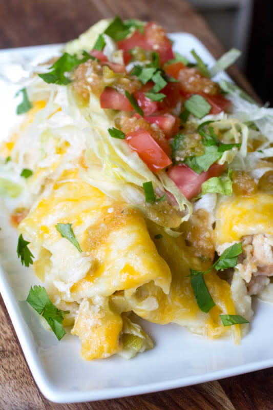<p>Or Whatever You Do</p><p>These Traeger smoked green chile chicken enchiladas are incredibly tasty.</p><p><strong>Get the recipe: <a href="https://www.orwhateveryoudo.com/2018/08/traeger-smoked-green-chile-chicken-enchiladas.html" rel="nofollow noopener" target="_blank" data-ylk="slk:Traeger Smoked Green Chile Chicken Enchiladas;elm:context_link;itc:0;sec:content-canvas" class="link ">Traeger Smoked Green Chile Chicken Enchiladas</a></strong></p>