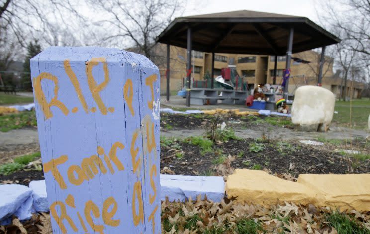 "R.I.P. Tamir Rice" was painted on a block of wood near a memorial for Rice outside the Cudell Recreation Center, Dec. 29, 2015, in Cleveland. (Photo: Tony Dejak/AP)