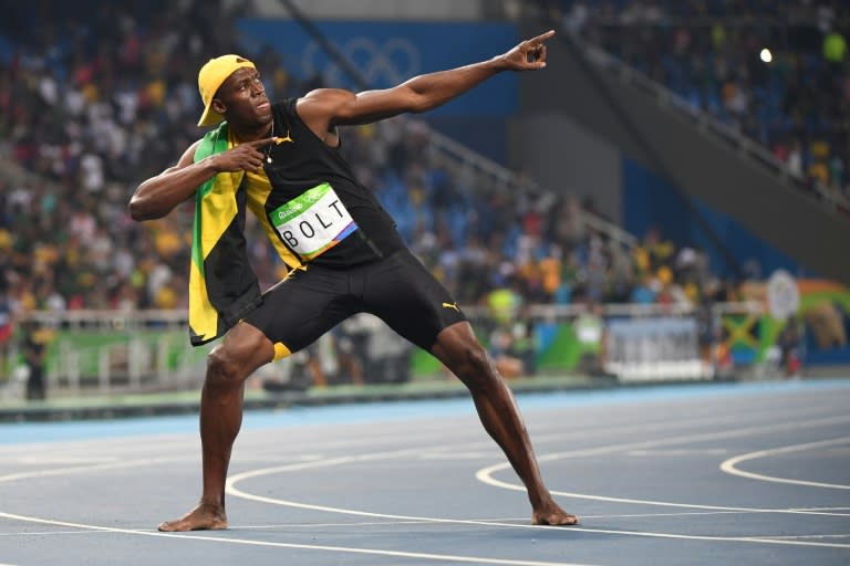 Jamaica's Usain Bolt does his 'Lightening Bolt' pose after winning the 100m final during the Rio 2016 Olympic Games