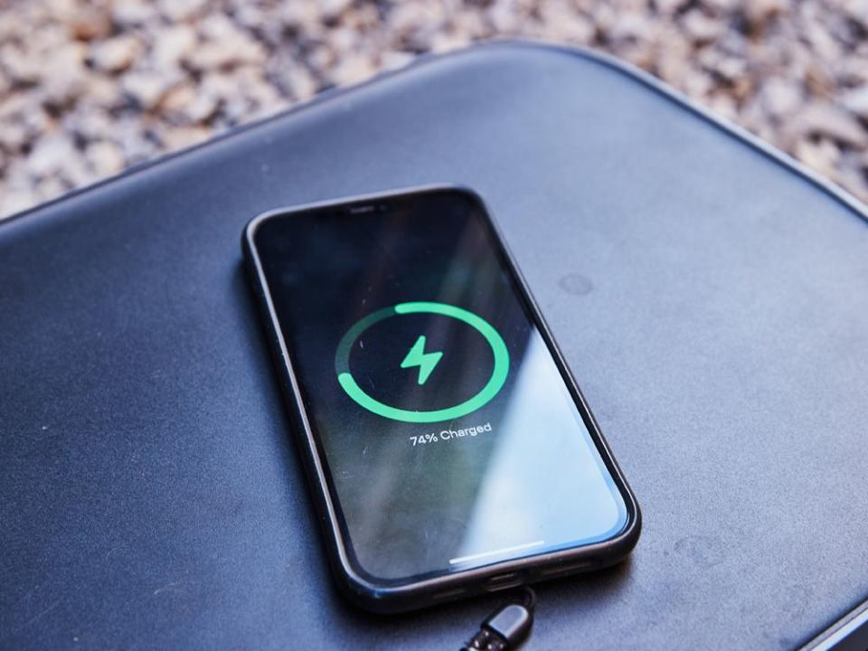 a cell phone charing on a solar generator