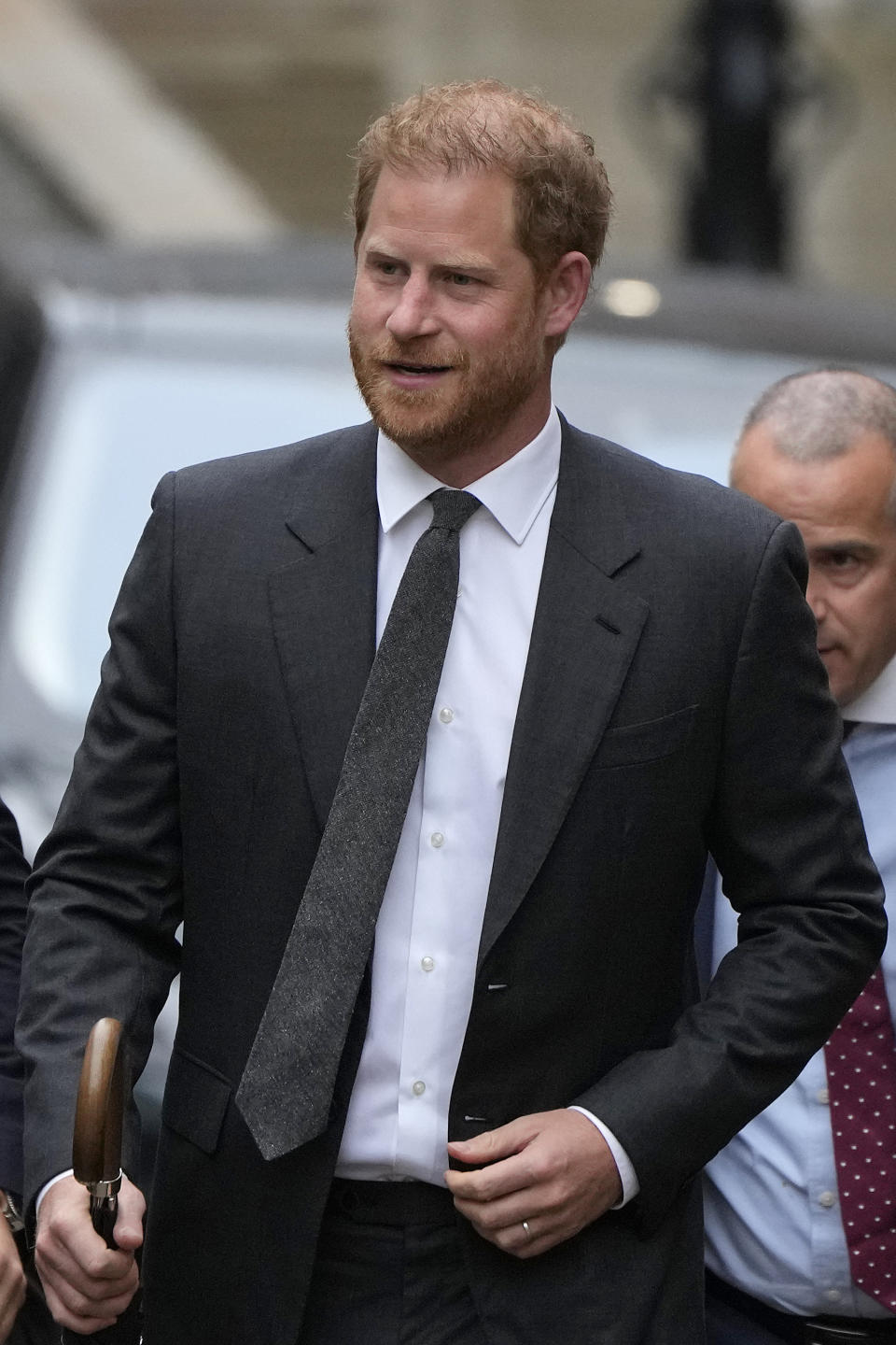 Britain's Prince Harry arrives at the Royal Courts Of Justice in London, Tuesday, March 28, 2023. Prince Harry is in a London court on Tuesday as the lawyer for a group of British tabloids prepared to ask a judge to toss out lawsuits by the prince, Elton John and several other celebrities who allege phone tapping and other invasions of privacy.(AP Photo/Alastair Grant)