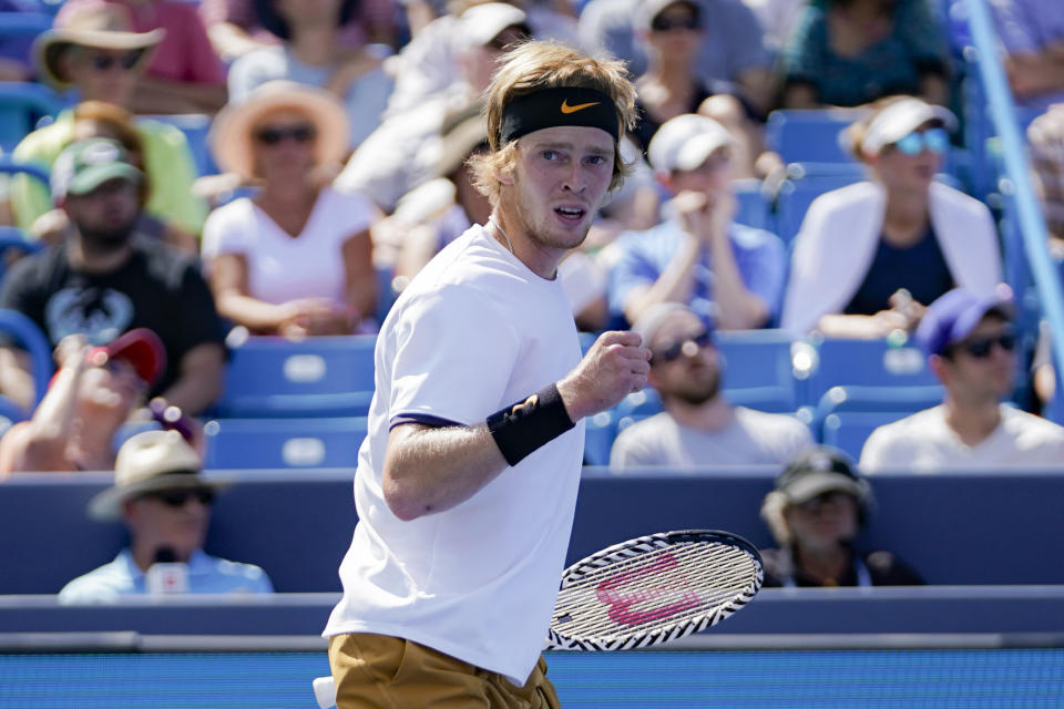 Andrey Rublev, of Russia, reacts during a match against Roger Federer, of Switzerland, during the quarterfinals of the Western & Southern Open tennis tournament, Thursday, Aug. 15, 2019, in Mason, Ohio. (AP Photo/John Minchillo)