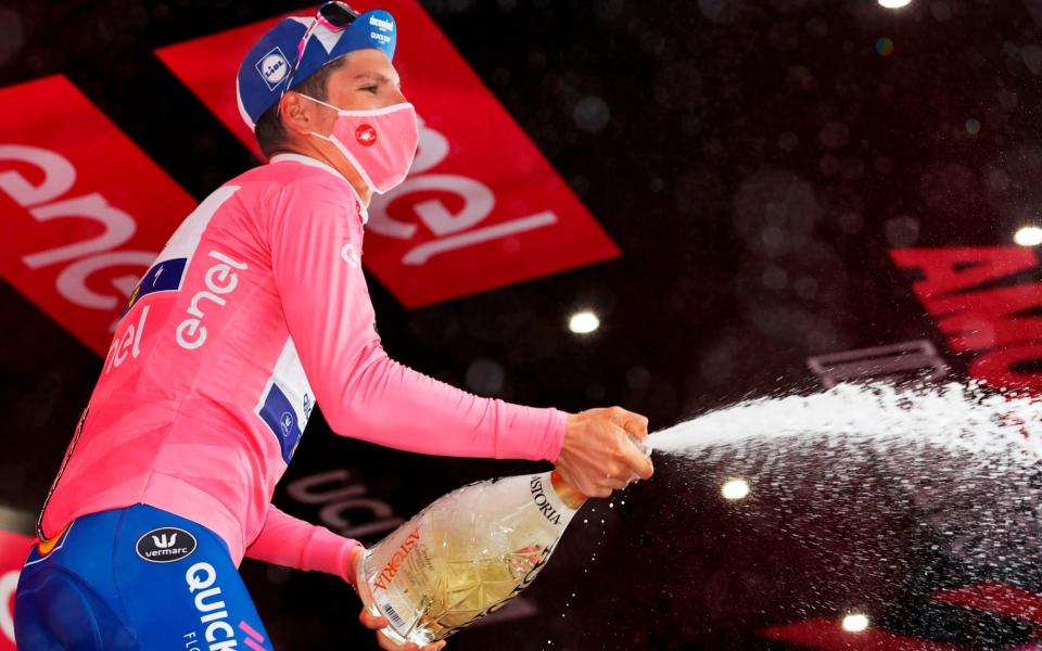 Joao Almeida celebrates retaining the pink jersey - AFP