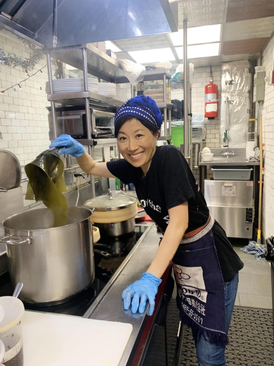 Yumi Komatsudaira prepares a Japanese dish (Enoteca Maria)