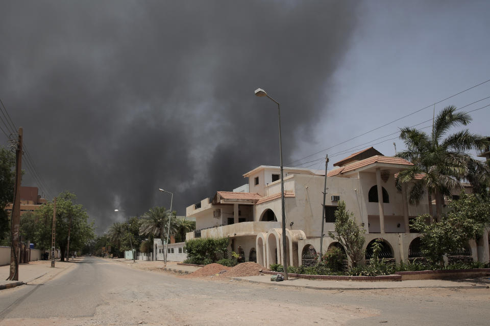 Smoke is seen rising from a neighborhood in Khartoum, Sudan, Saturday, April 15, 2023. Fierce clashes between Sudan’s military and the country’s powerful paramilitary erupted in the capital and elsewhere in the African nation after weeks of escalating tensions between the two forces. The fighting raised fears of a wider conflict in the chaos-stricken nation. (AP Photo/Marwan Ali)