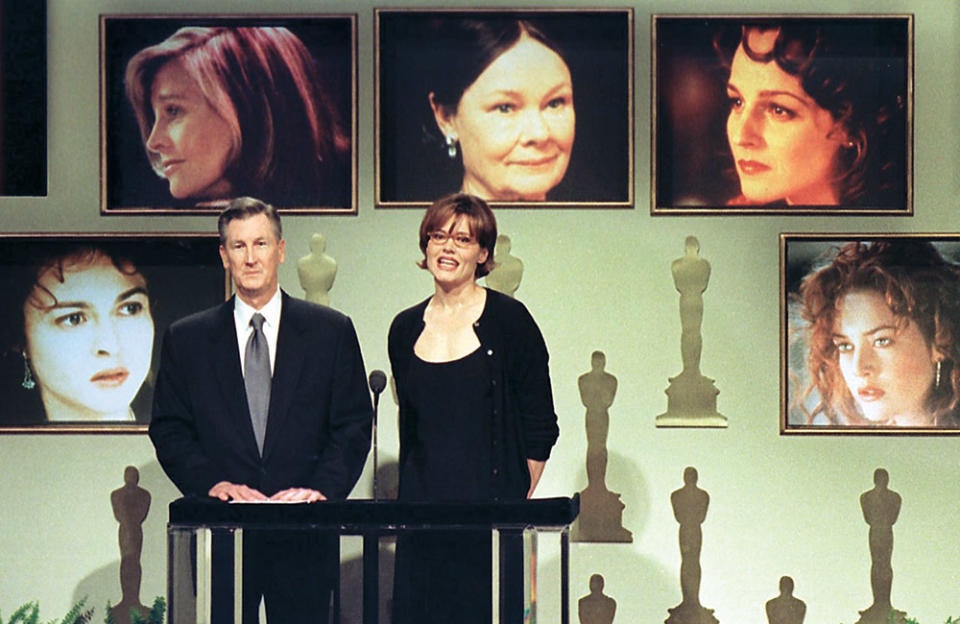 Academy of Motion Picture Arts and Sciences president Robert Rehme and Geena Davis announced the Oscar nominations Feb. 10, 1998.