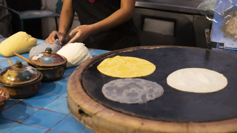 Corn tortillas on comal