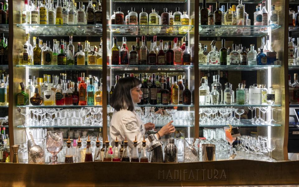 Small local shops are changing to businesses like bars that target tourists