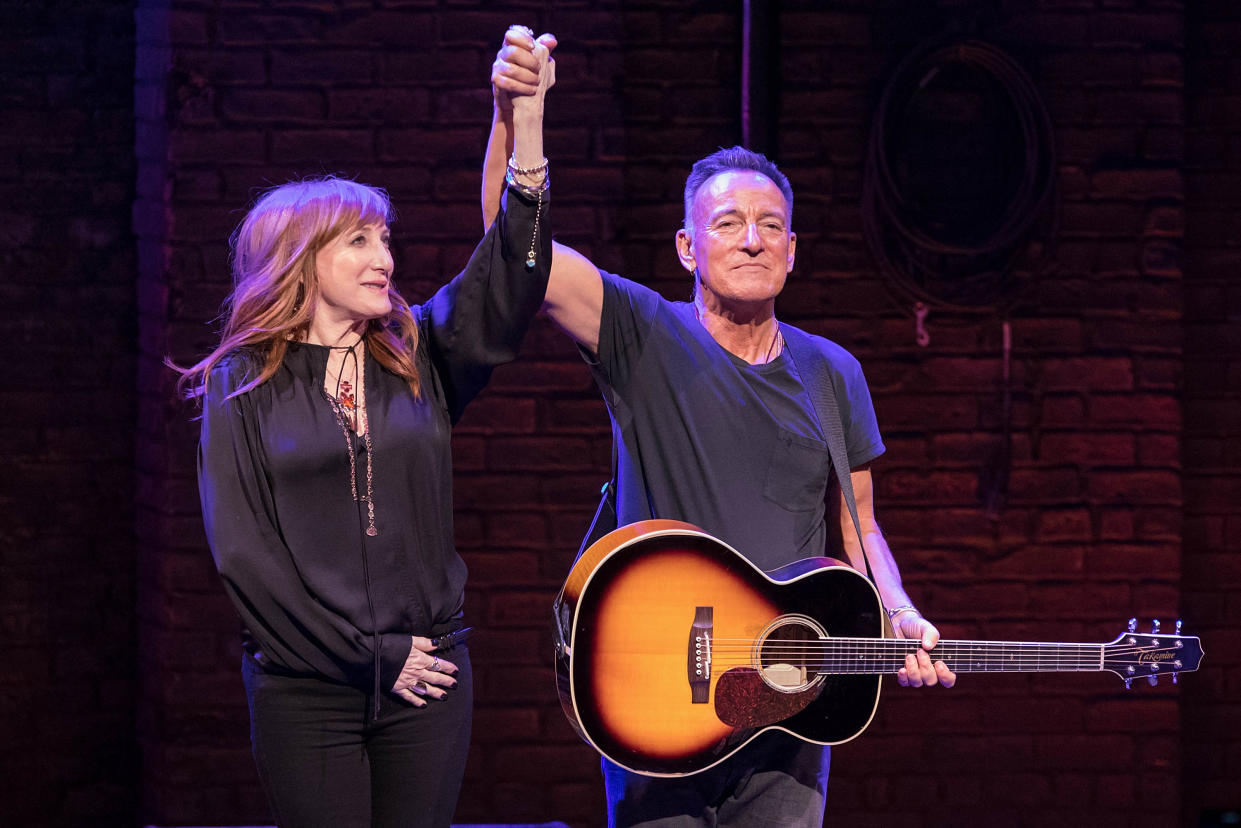 Patti Scialfa and Bruce Springsteen onstage.