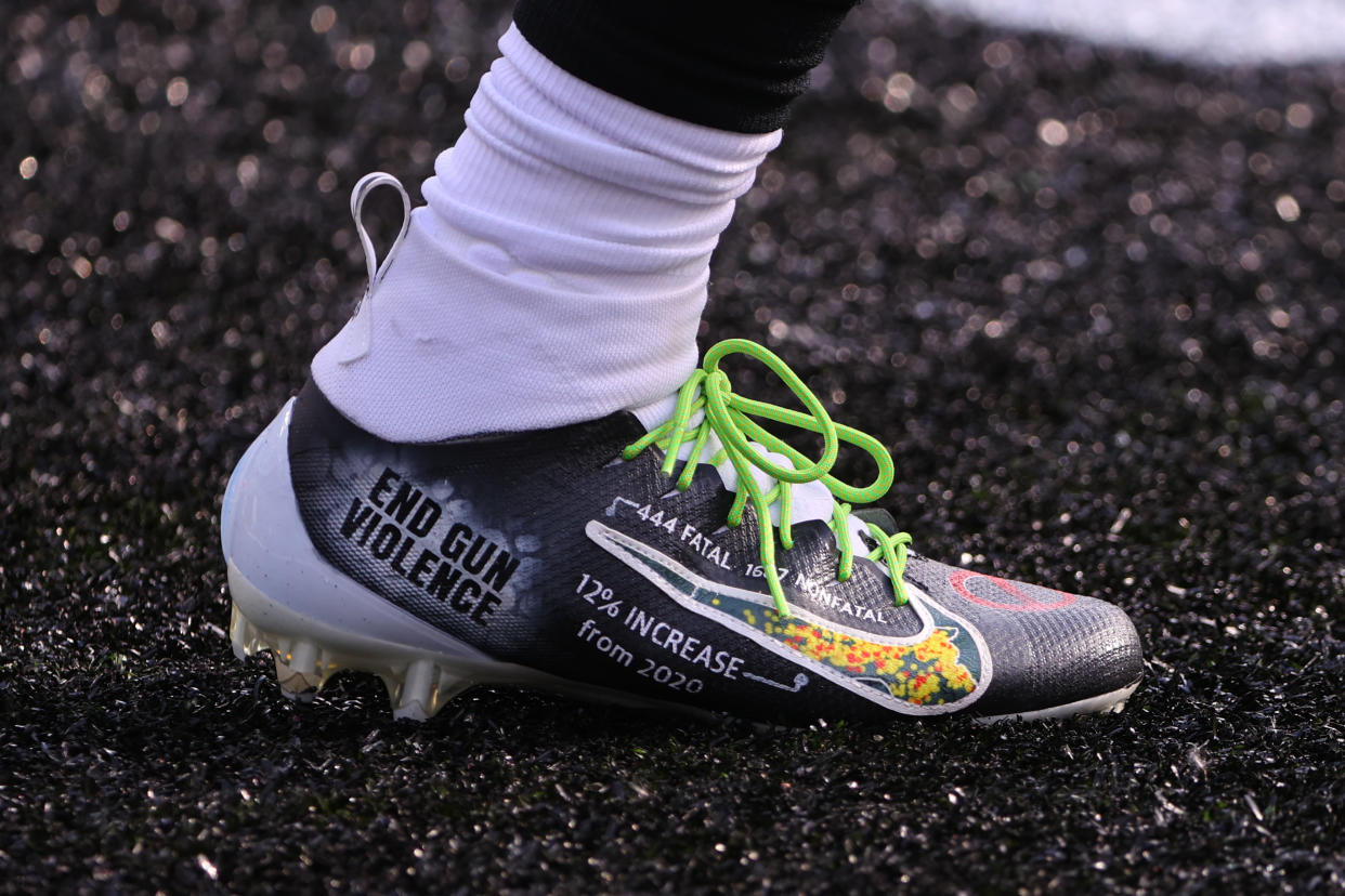 EAST RUTHERFORD, NJ - DECEMBER 05: Philadelphia Eagles running back Miles Sanders (26) End Gun Violence cleats for My Cause My Cleats prior to the National Football League game between the New York Jets and the Philadelphia Eagles on December 5, 2021 at MetLife Stadium in East Rutherford, NJ. (Photo by Rich Graessle/Icon Sportswire via Getty Images)