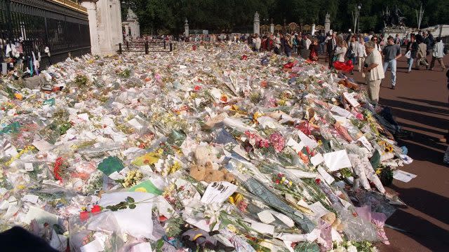 Floral tributes laid at the gates of Buckingham Palace following Princess Diana's death