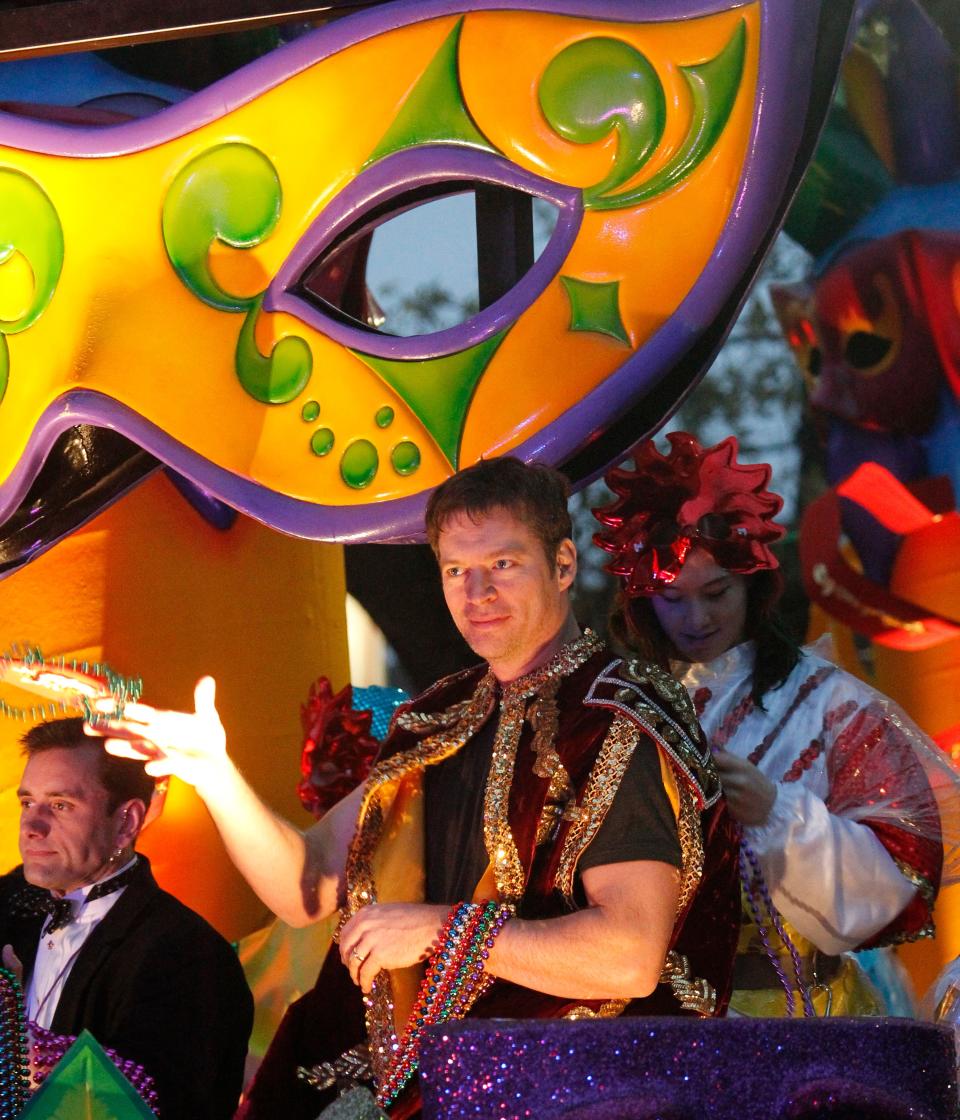 Entertainer Harry Connick, Jr. rides in the Orpheus Mardi Gras parade as it rolls through the streets of New Orleans, Monday, Feb. 11, 2013. Connick is the founder of the parade.