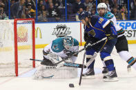 ST. LOUIS, MO - APRIL 21: Antti Niemi #31 of the San Jose Sharks makes a save against Scott Nichol #12 of the St. Louis Blues as Tommy Wingels #57 of the San Jose Sharks defends during Game Five of the Western Conference Quarterfinals during the 2012 NHL Stanley Cup Playoffs at the Scottrade Center on April 21, 2012 in St. Louis, Missouri. The Blues beat the Sharks 3-1 to advance to the Western Conference Semifinals. (Photo by Dilip Vishwanat/Getty Images)